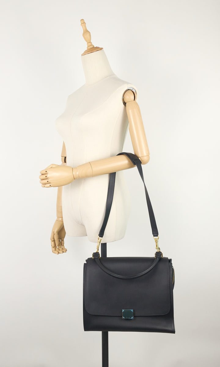 trapeze calfskin leather and suede bag