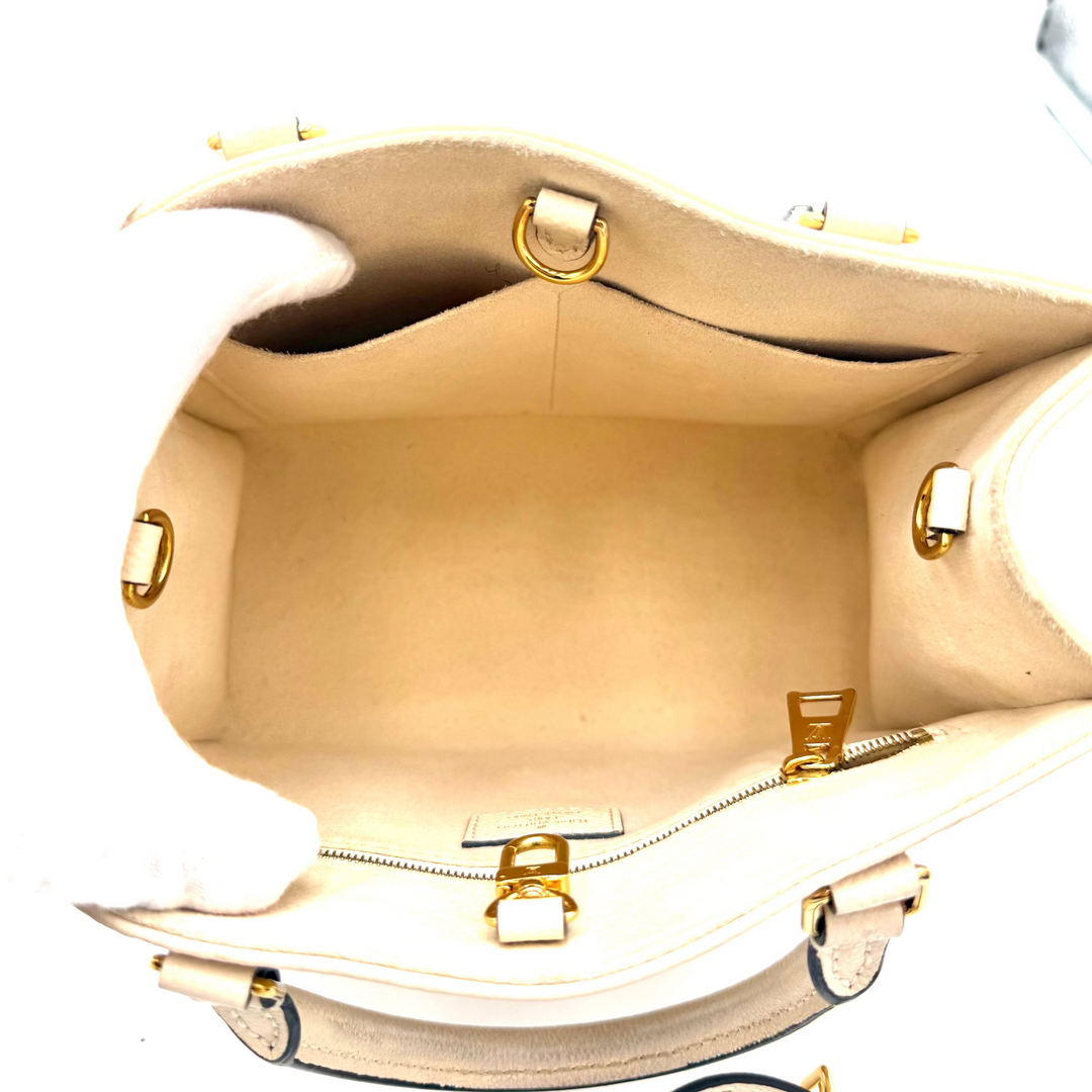 Monogram Empreinte Leather On The Go PM Bi-Colour in Creme/Bois De Rose