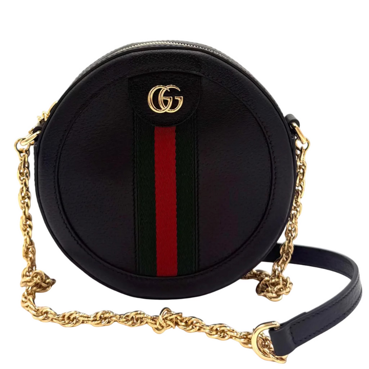A black round Gucci crossbody bag with a gold chain strap, featuring the iconic green and red web stripe and gold GG logo on the front.