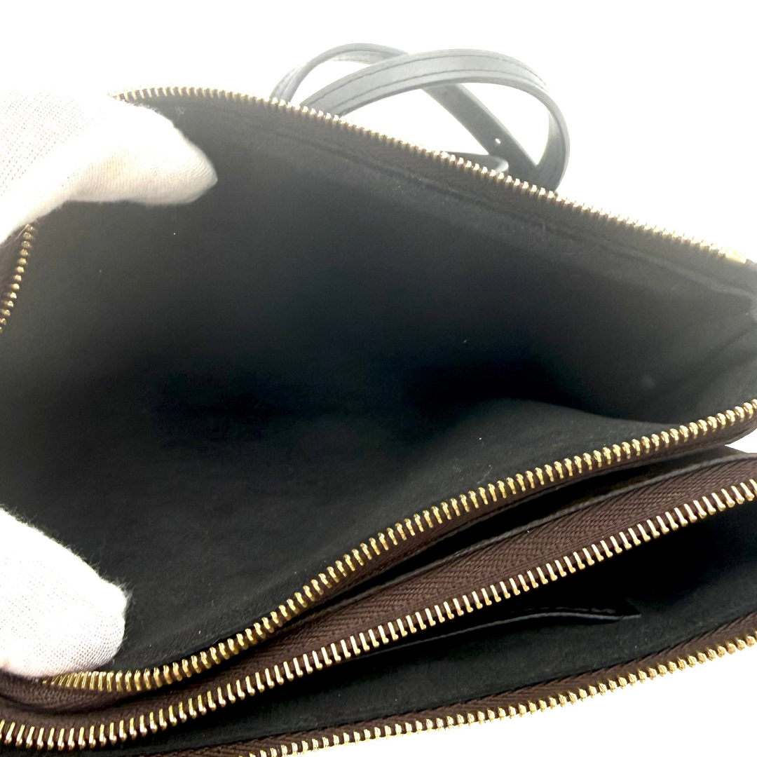Reverse Monogram Giant Canvas Double Zip Pochette