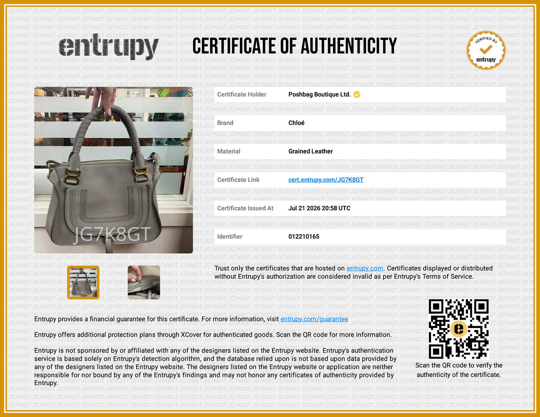A certificate of authenticity document for a Clued leather handbag by Entrupy, featuring a photo of the gray and gold handbag, product details in a table, a QR code, and a gold certification seal.