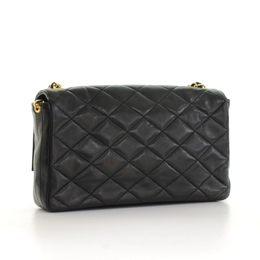 quilted leather single flap handbag
