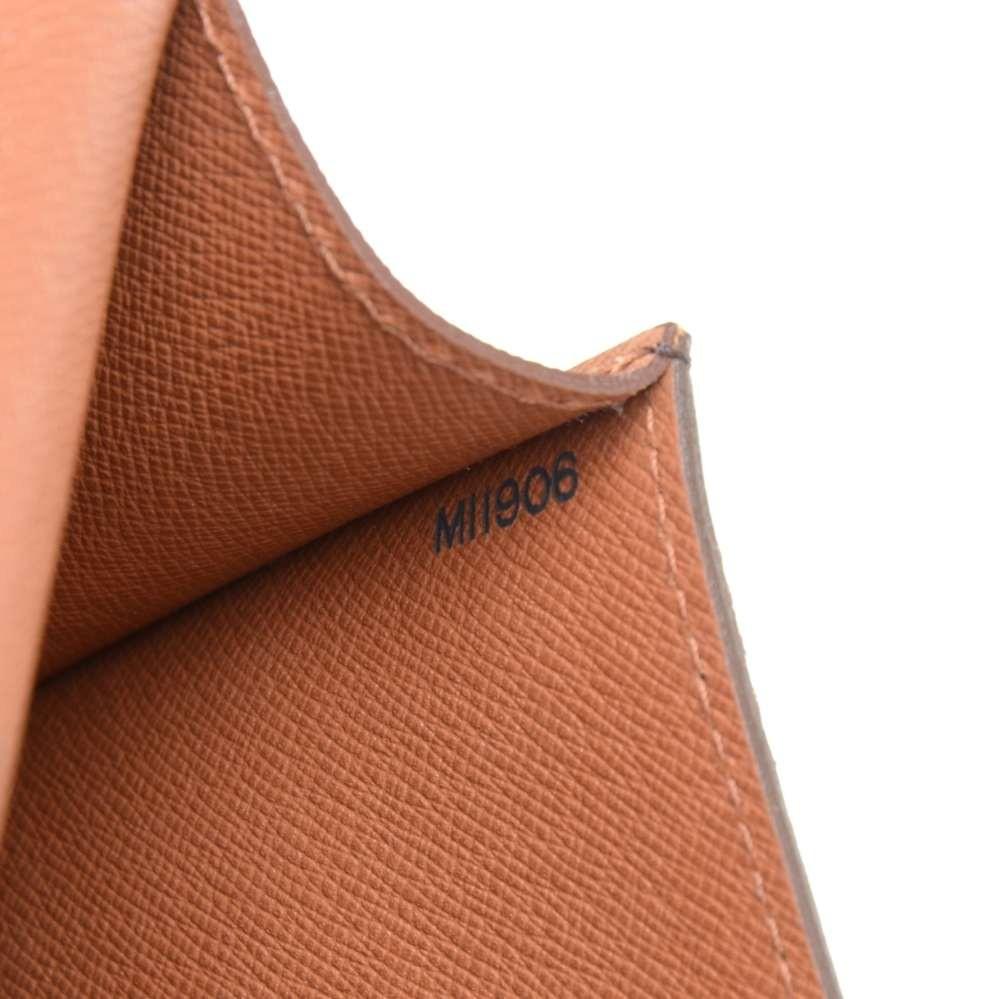 pochette arche monogram canvas clutch bag with belt