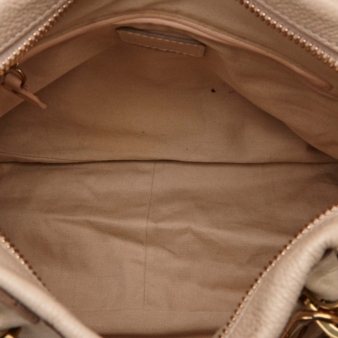paraty pebbled leather medium shoulder bag
