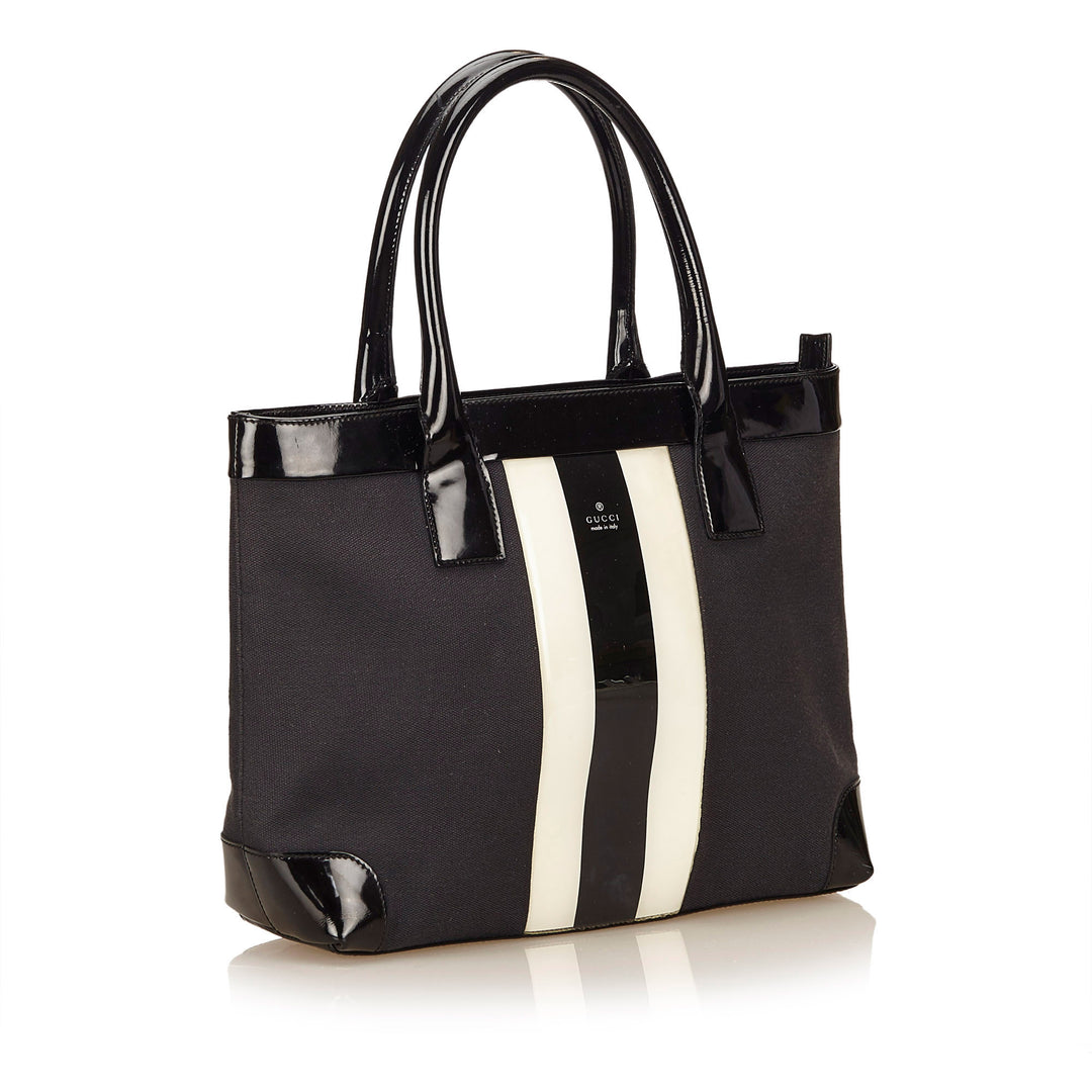 canvas and patent leather striped tote bag