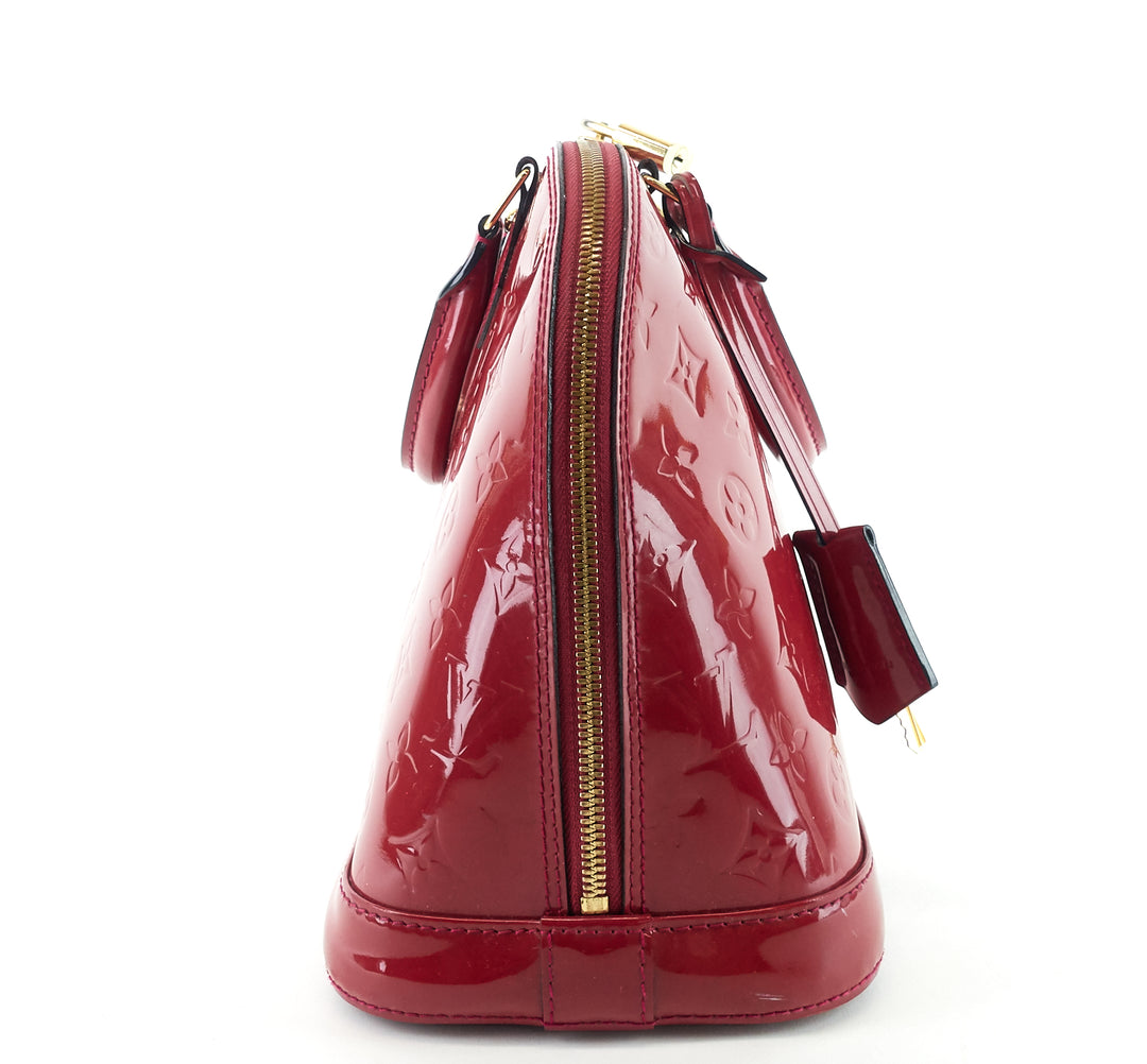 alma pm monogram vernis leather handbag