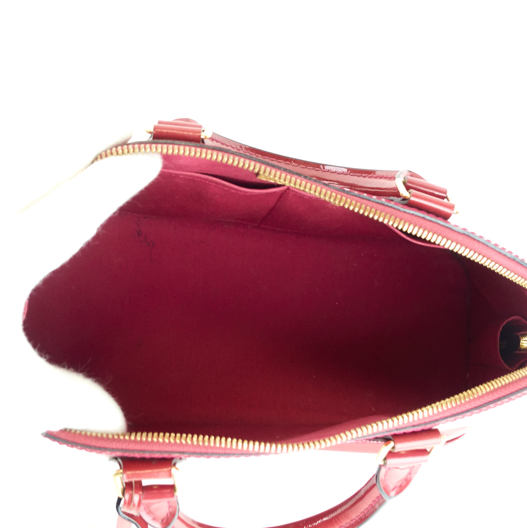 alma pm monogram vernis leather handbag