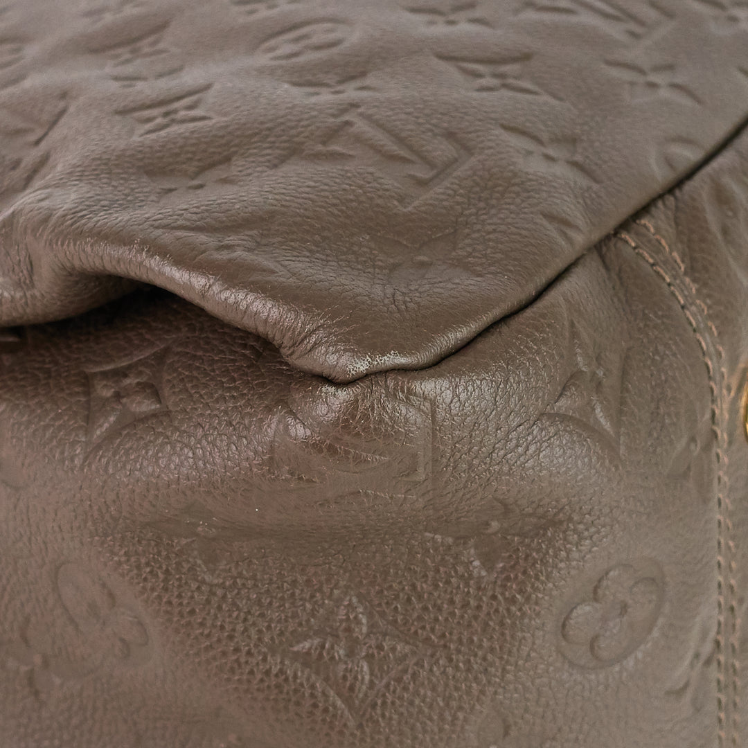artsy mm monogram empreinte leather handbag
