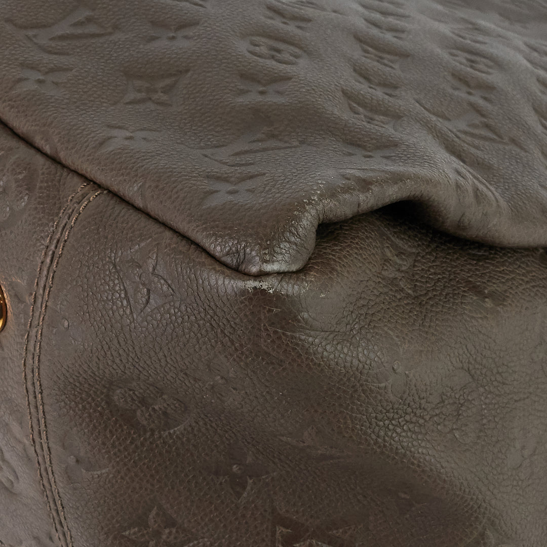artsy mm monogram empreinte leather bag