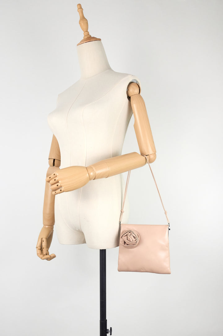 rosette lambskin leather clutch bag