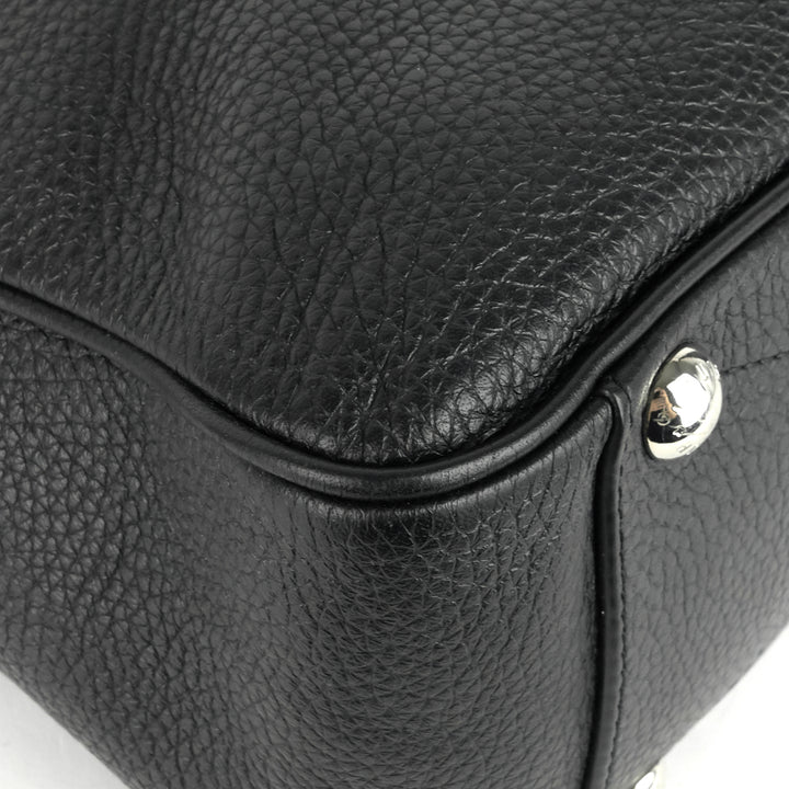 armand taurillon leather messenger bag