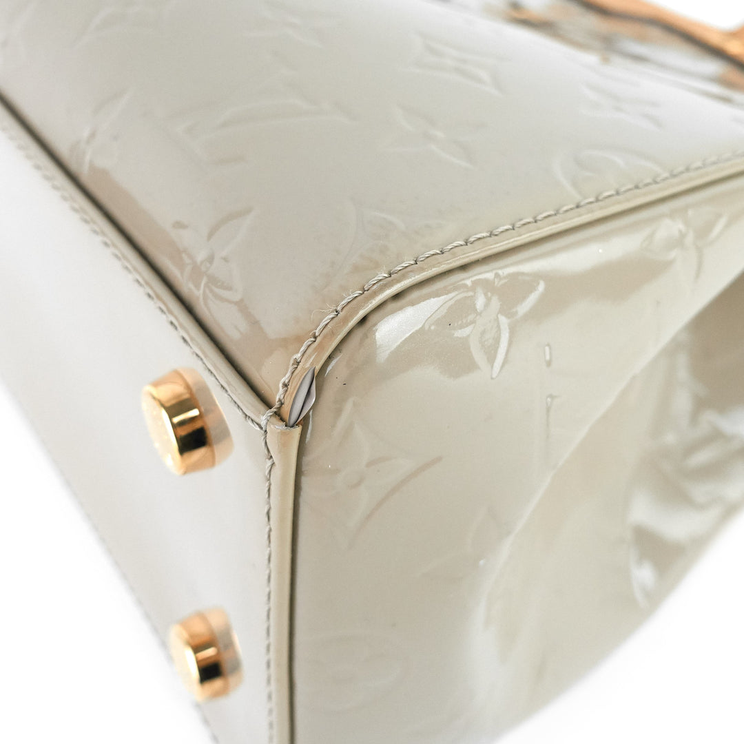 brea mm beige poudre monogram vernis leather bag