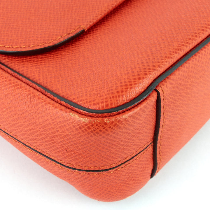 roman pm nm taiga leather messenger bag