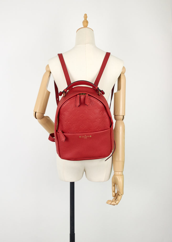 sorbonne monogram empreinte leather backpack