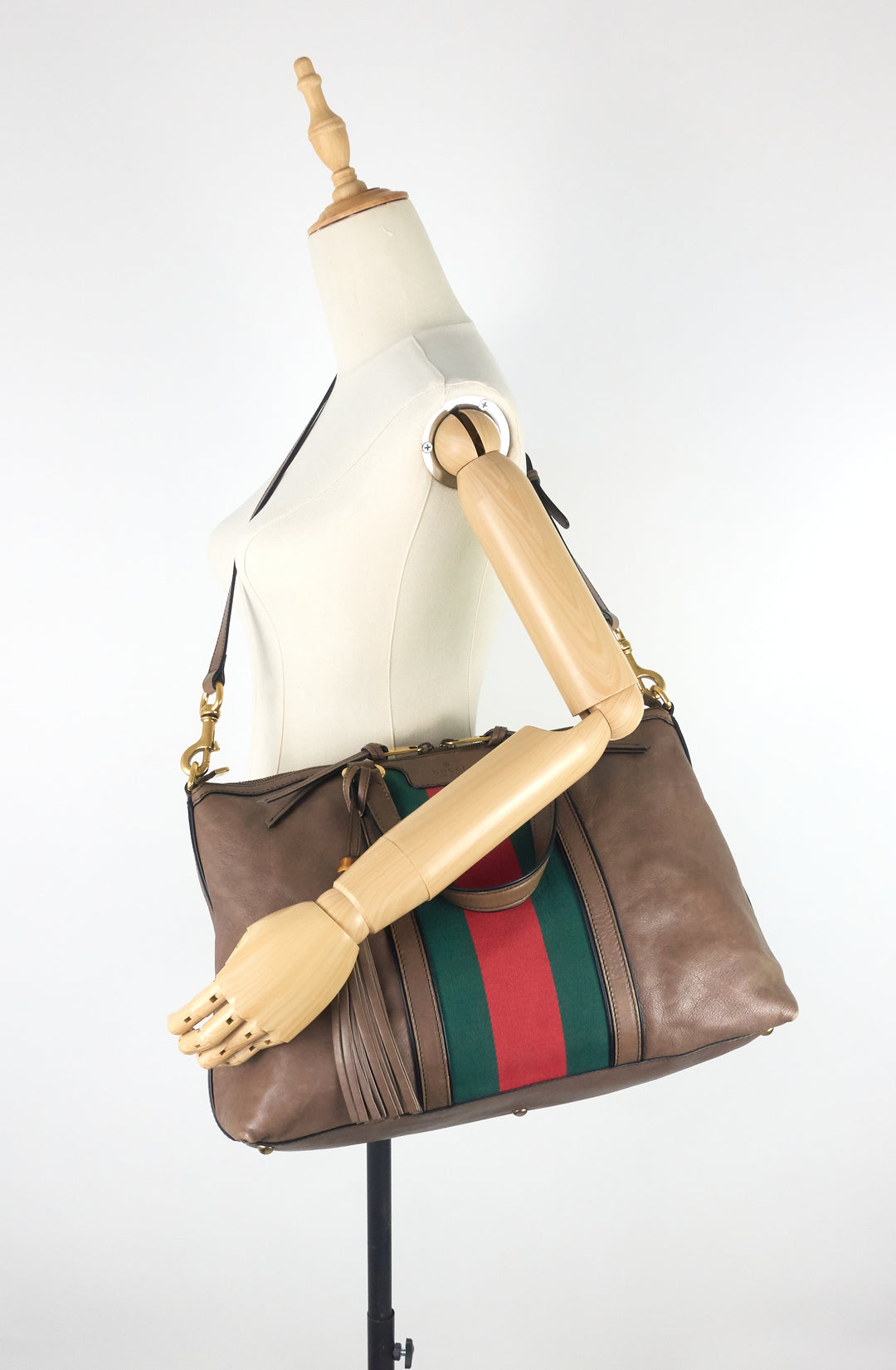 raina web top handle medium leather bag