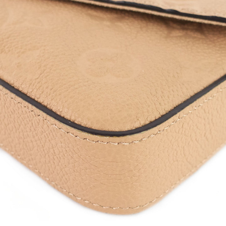 pochette félicie monogram empreinte leather chain wallet bag