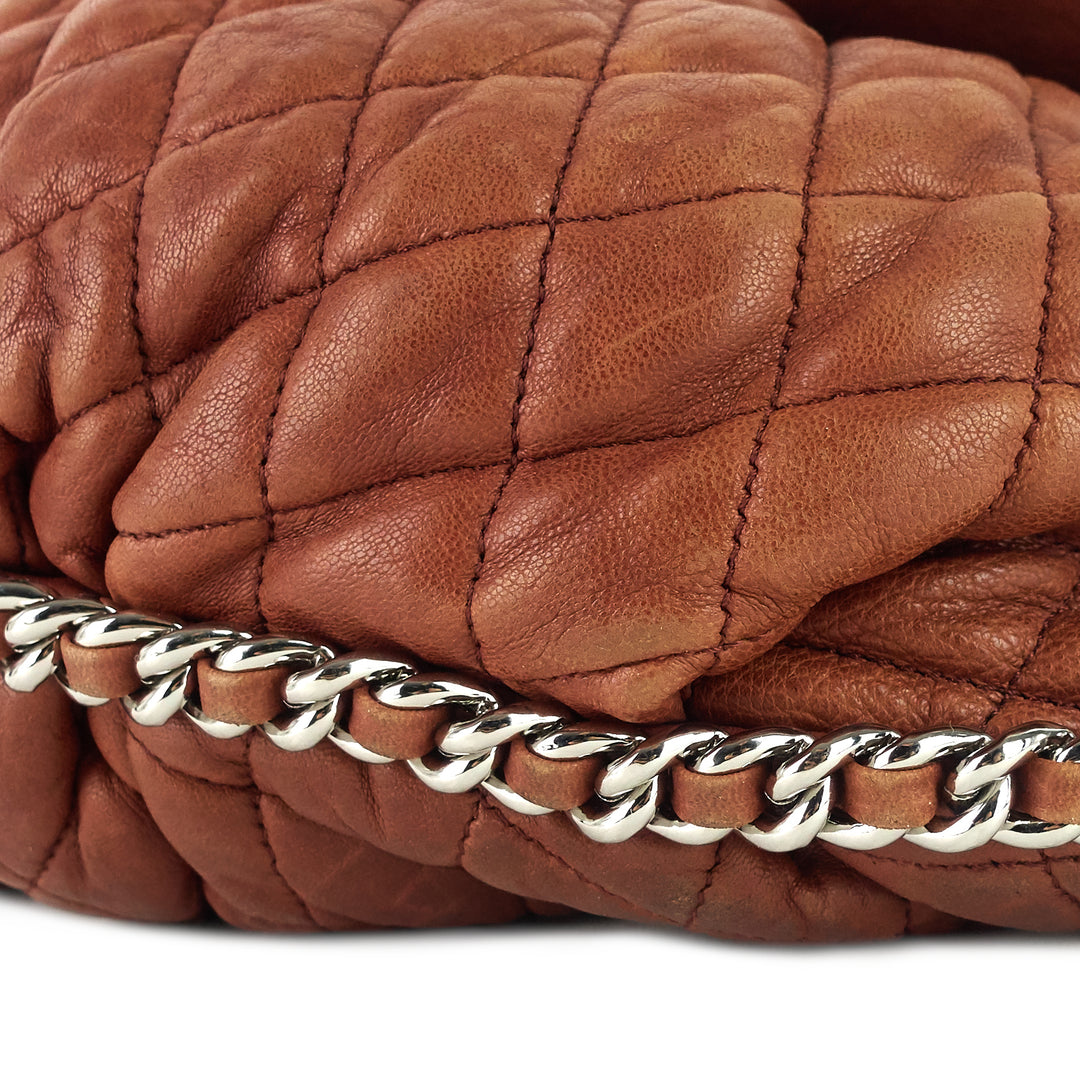 chain around large calfskin leather flap bag