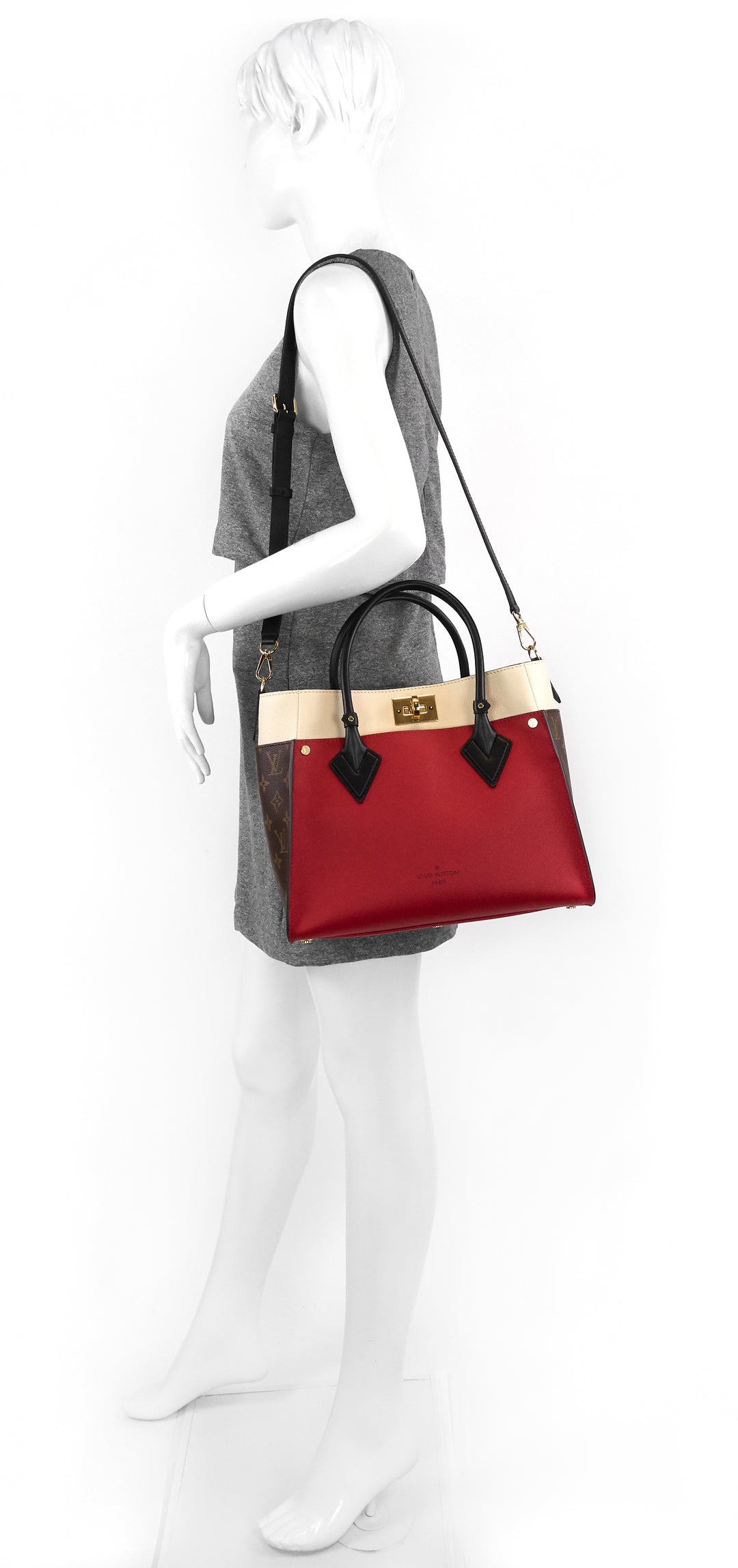 on my side pirate red calfskin and monogram canvas tote bag