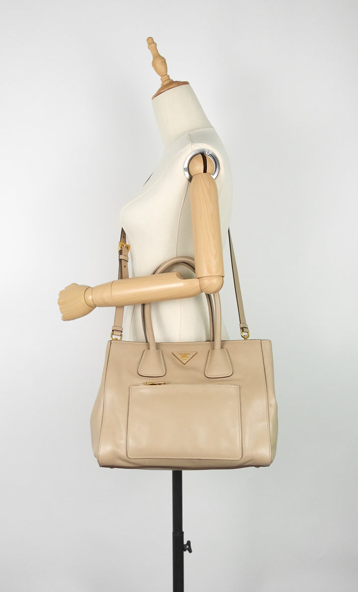 front pocket convertible wing soft leather tote bag