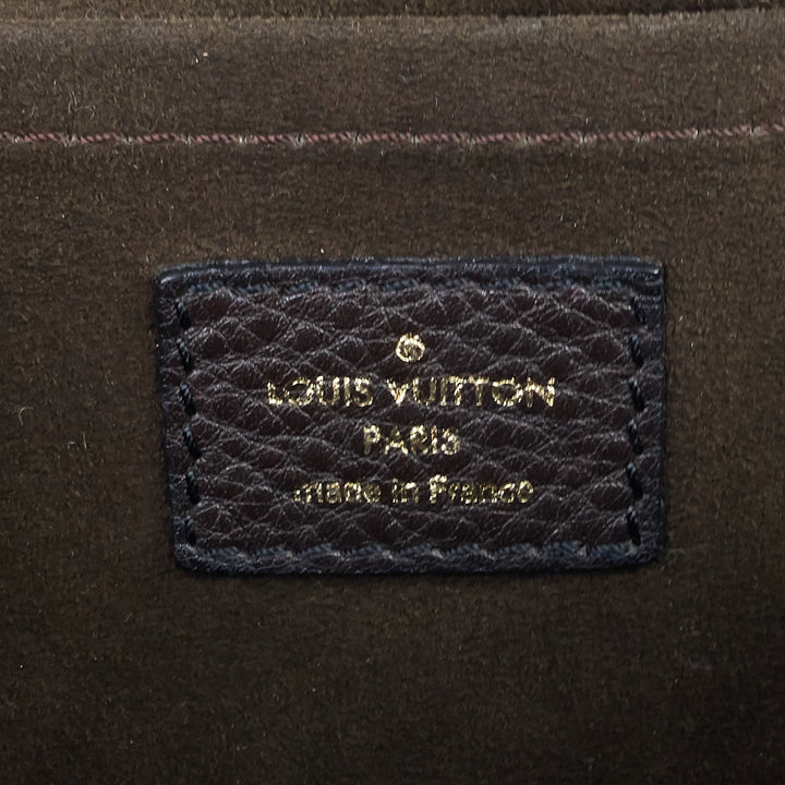 perforated monogram mahina leather xs bag