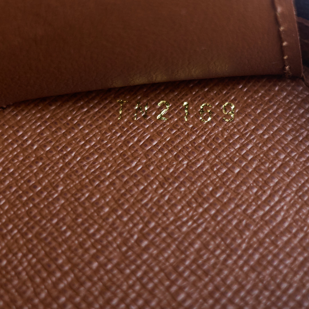 round monogram canvas coin case