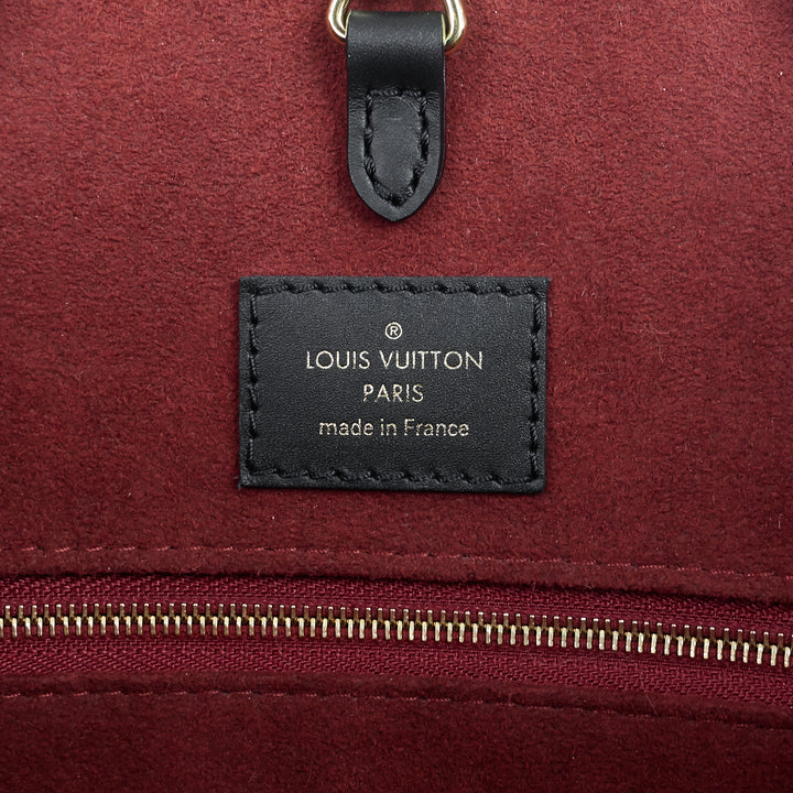 onthego mm bicolour monogram empreinte leather bag