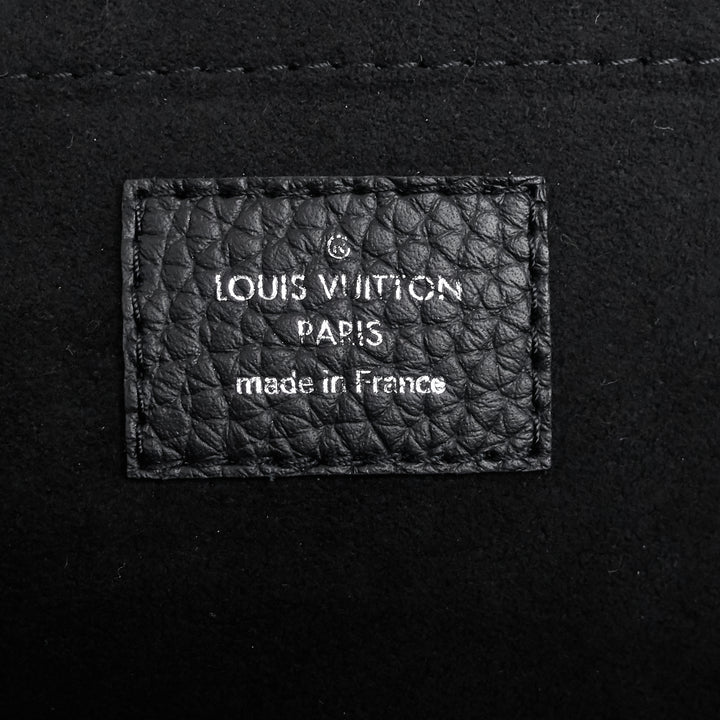 zip around jour gm taurillon leather pochette bag