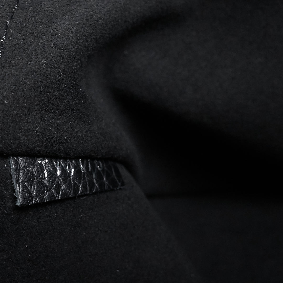 zip around jour gm taurillon leather pochette bag