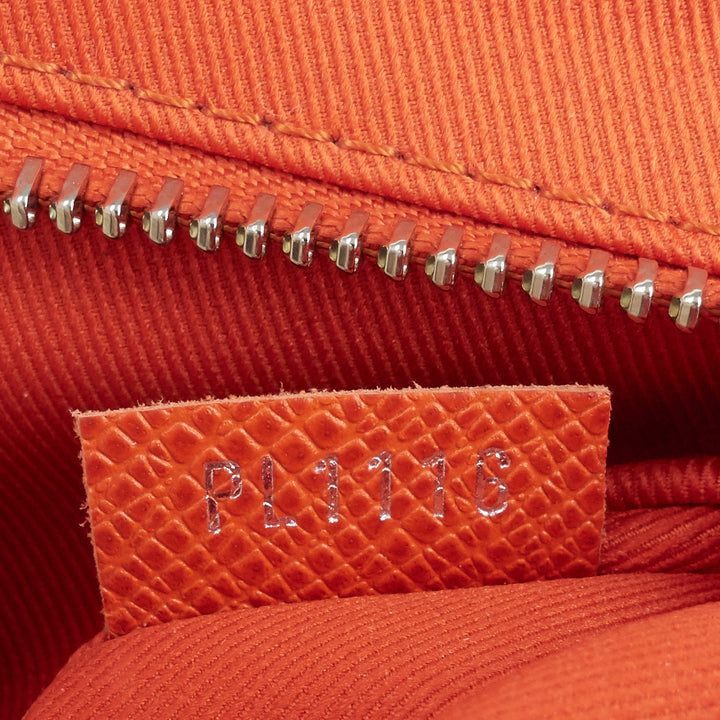 roman pm nm taiga leather messenger bag