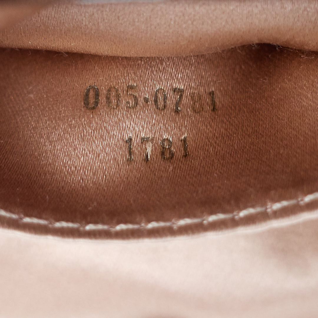 rosette lambskin leather clutch bag