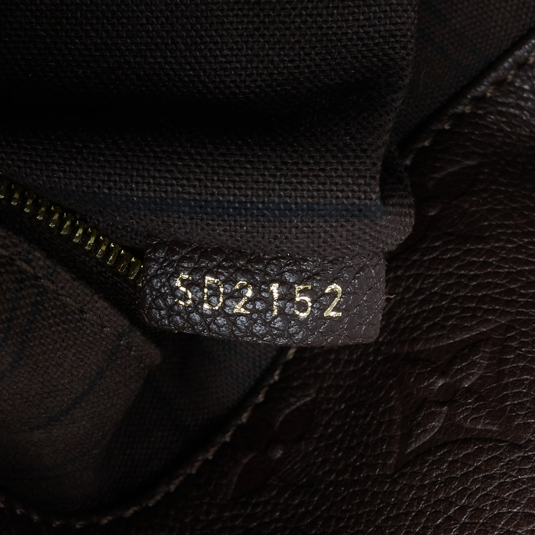 artsy mm monogram empreinte leather bag