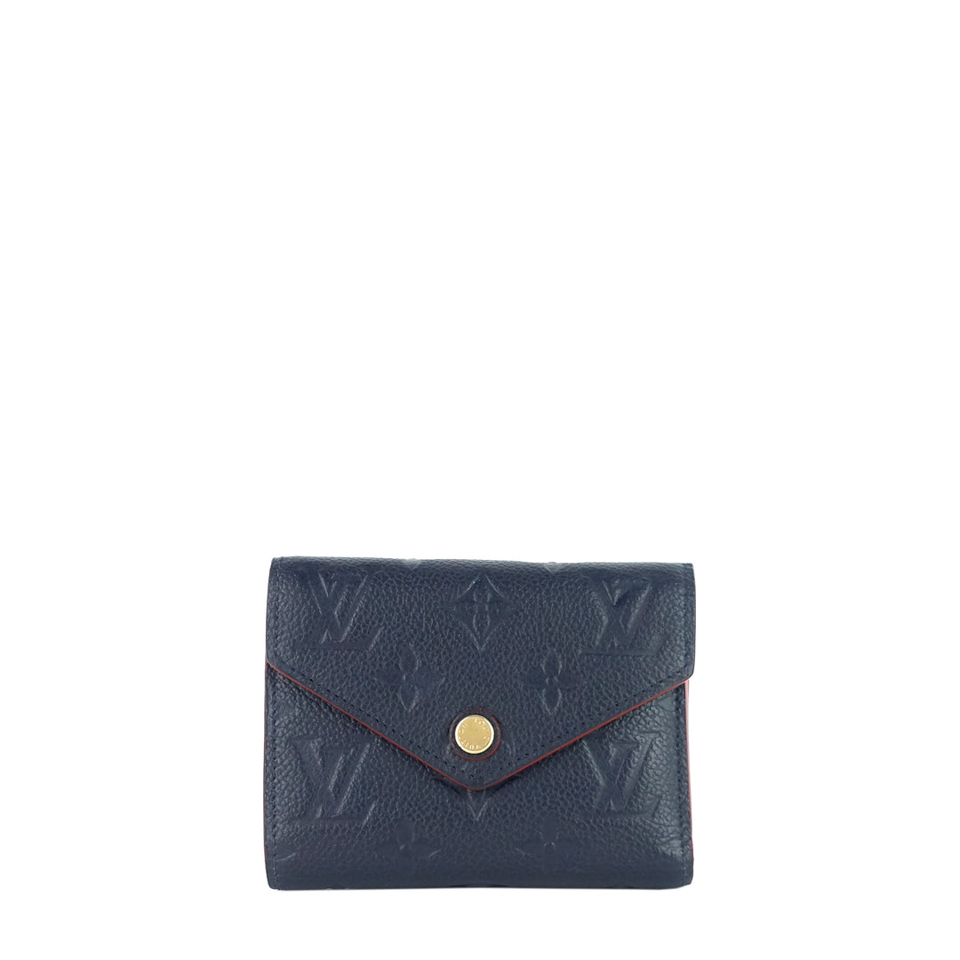 victorine monogram empreinte leather wallet