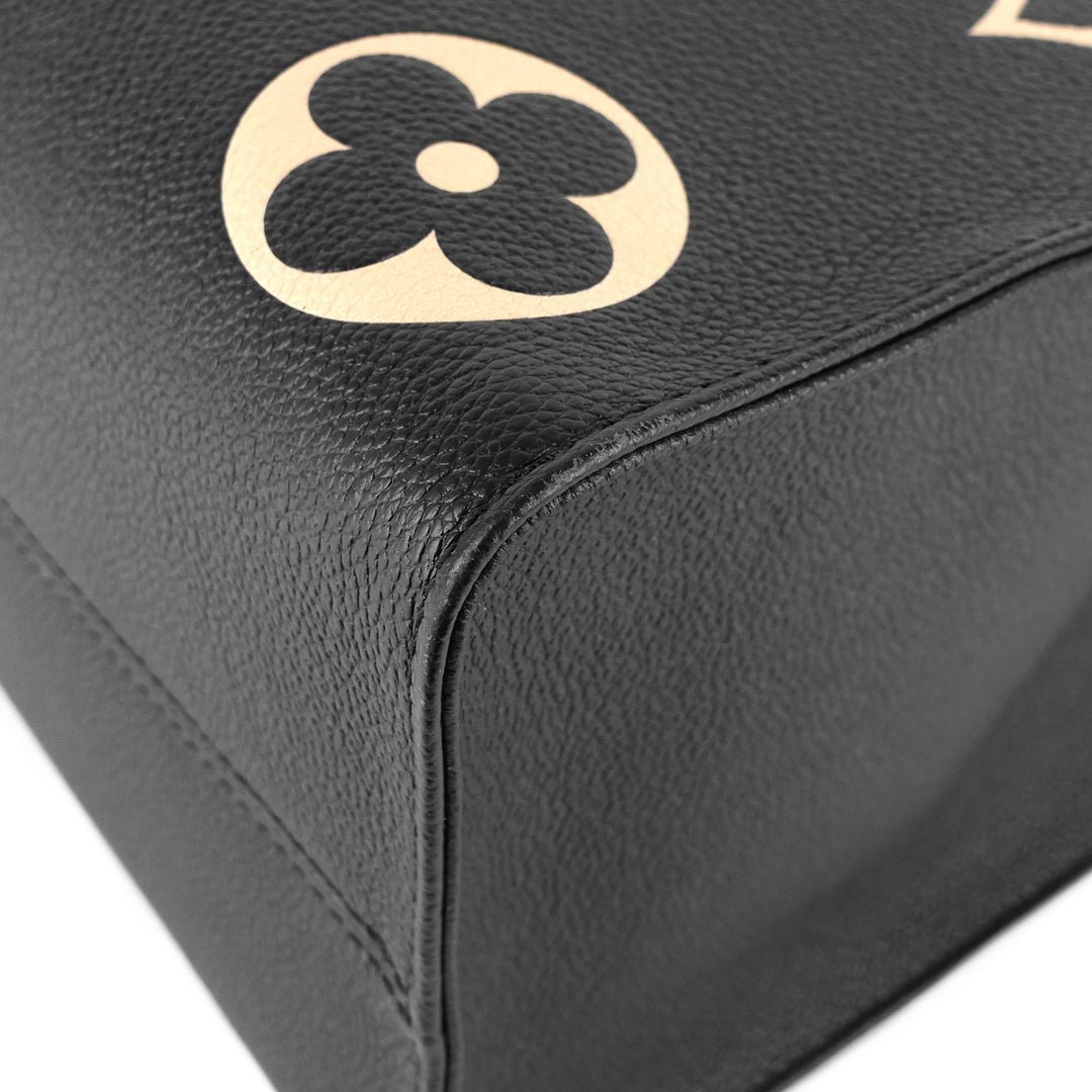 onthego mm bicolour monogram empreinte leather bag