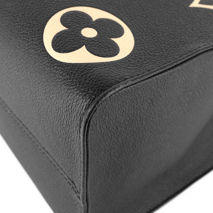 onthego mm bicolour monogram empreinte leather bag