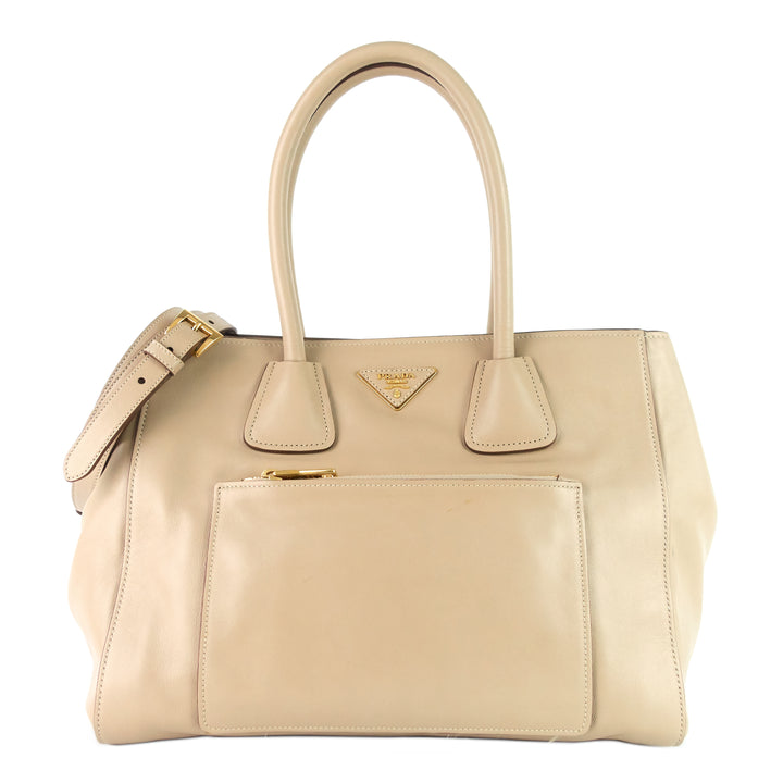 front pocket convertible wing soft leather tote bag