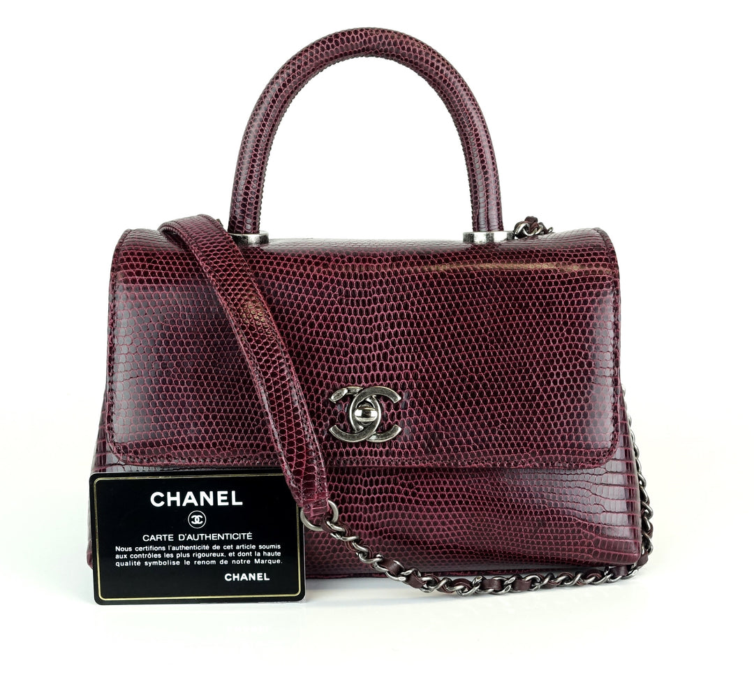 cc flap rolled top handle lizard small bag