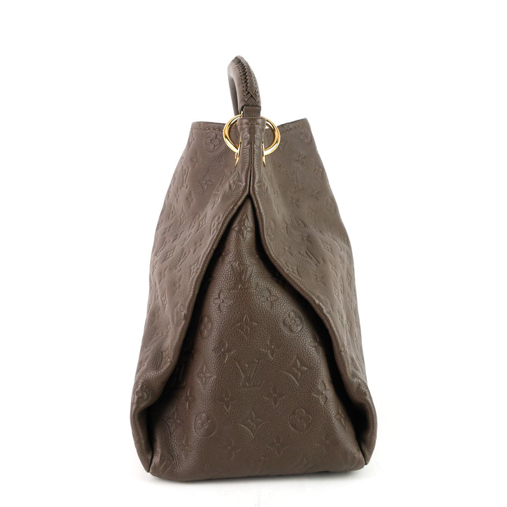 artsy mm monogram empreinte leather handbag