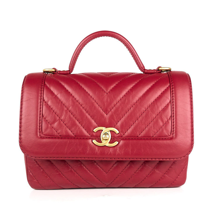 quilted chevron calfskin leather top handle bag