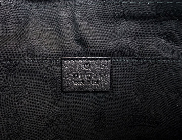 sienna grained leather tassel clutch bag