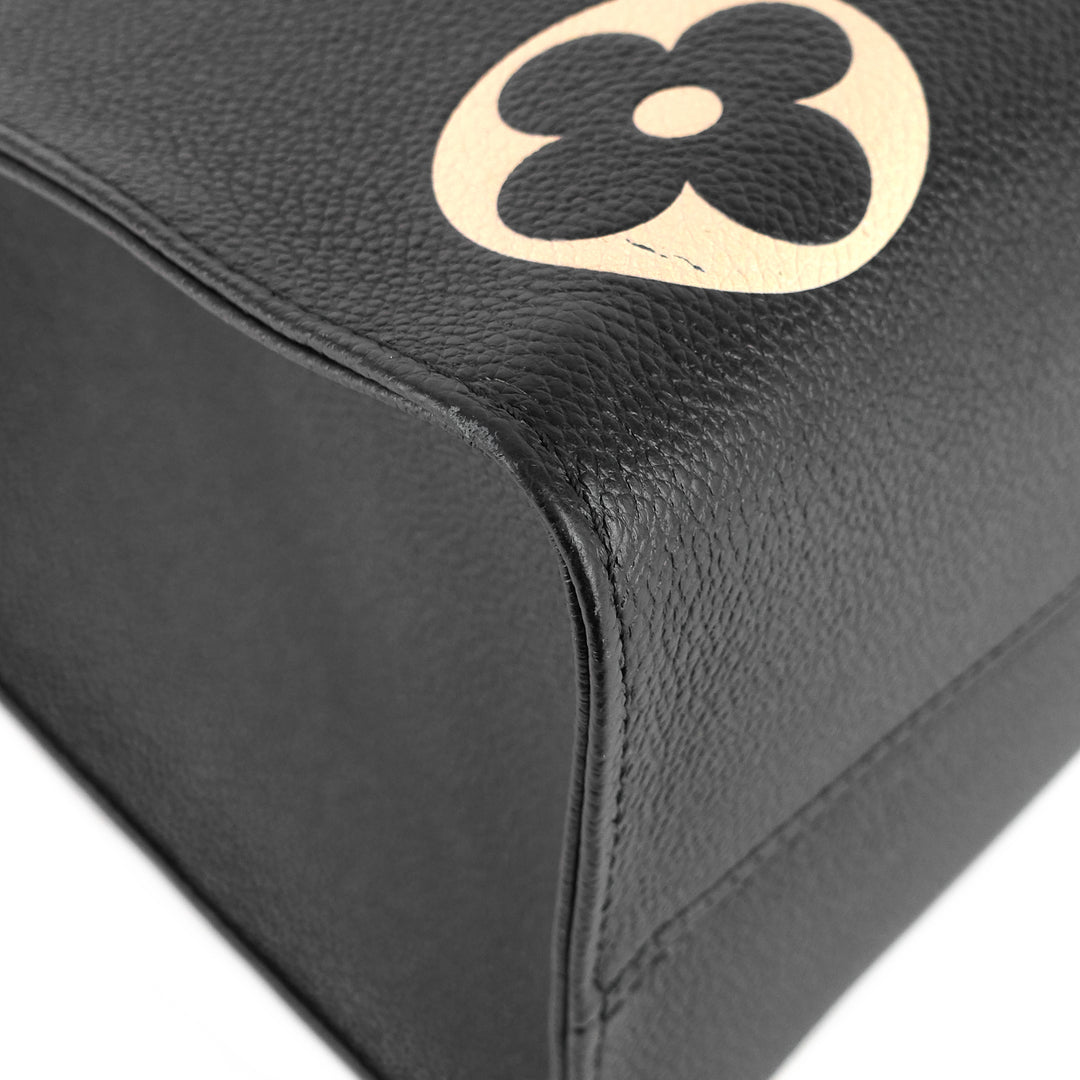 onthego mm bicolour monogram empreinte leather bag