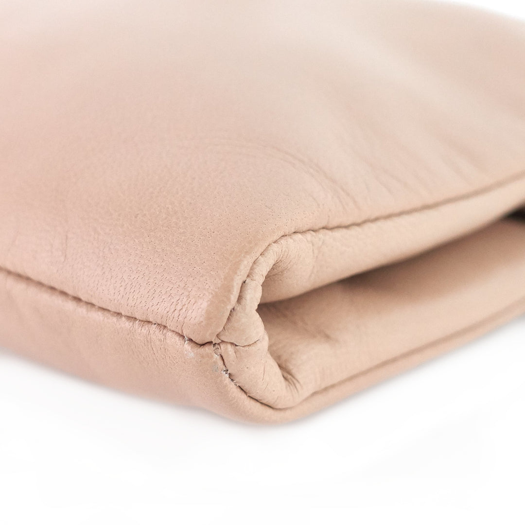 rosette lambskin leather clutch bag