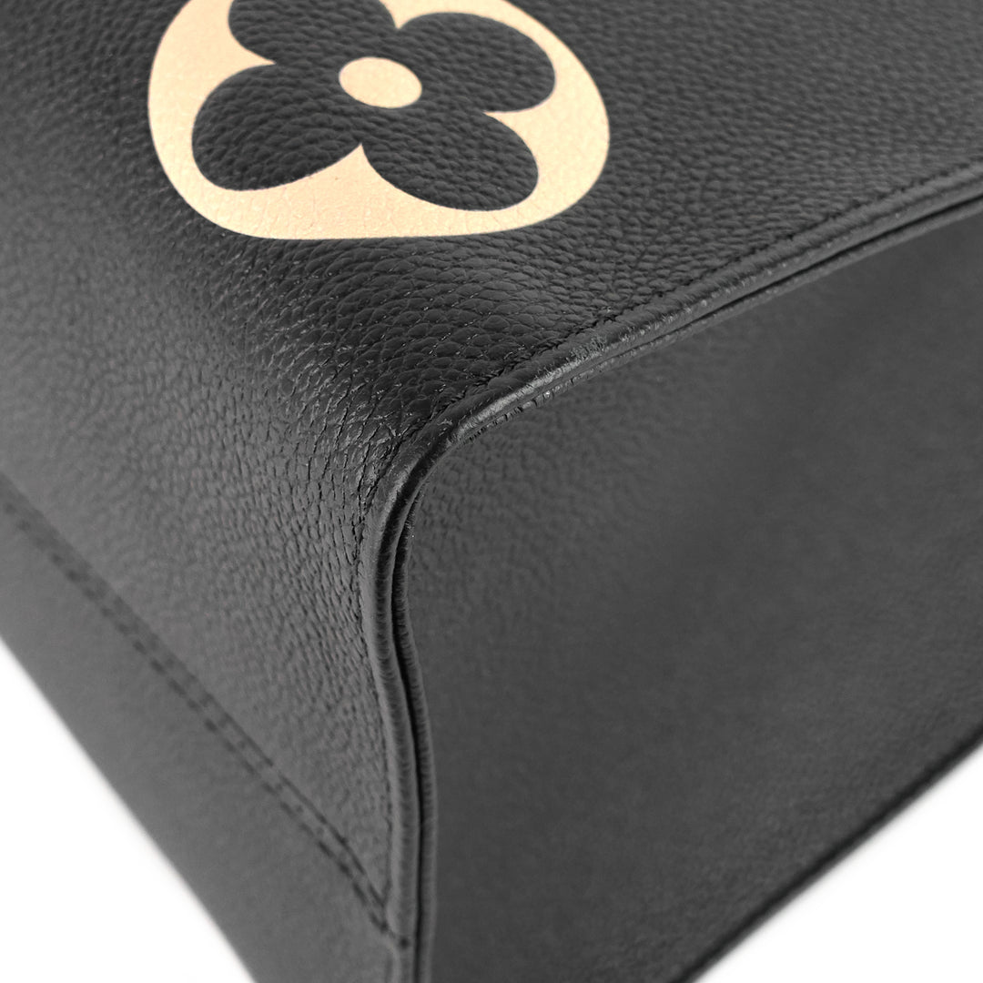 onthego mm bicolour monogram empreinte leather bag