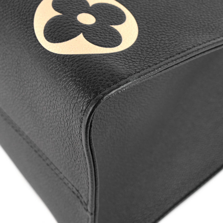 onthego mm bicolour monogram empreinte leather bag