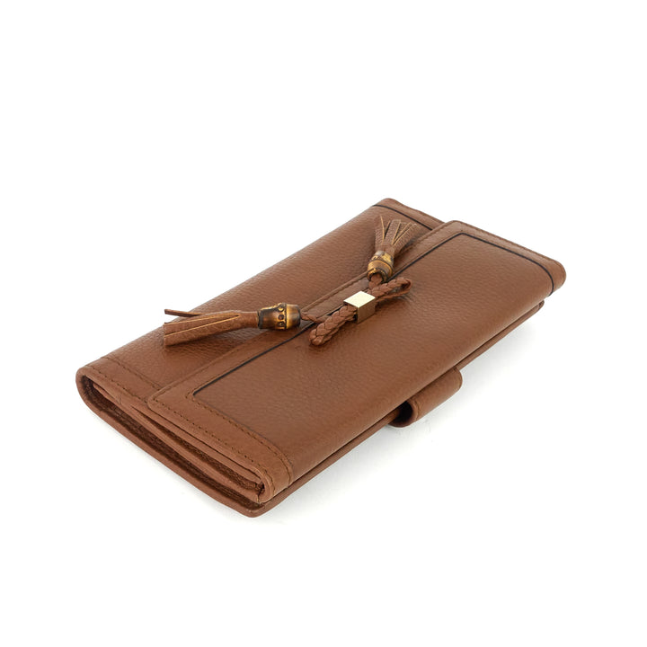 pebbled leather bamboo tassel bella continental wallet