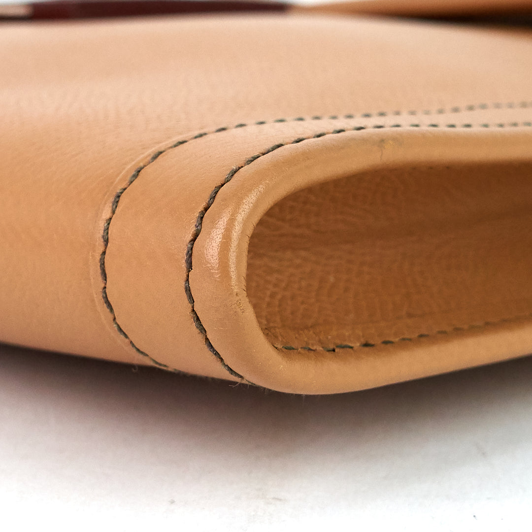 jige gm courchevel leather clutch bag