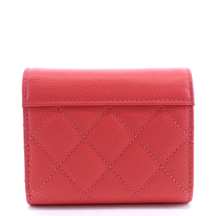 quilted caviar leather small flap wallet