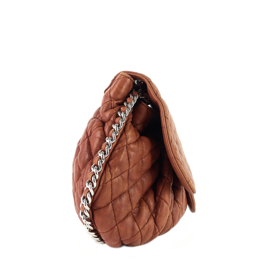 chain around large calfskin leather flap bag