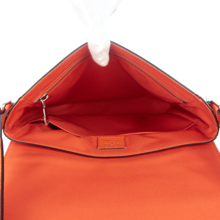 roman pm nm taiga leather messenger bag