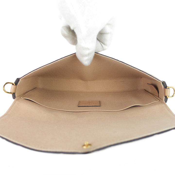 pochette félicie monogram empreinte leather chain wallet bag