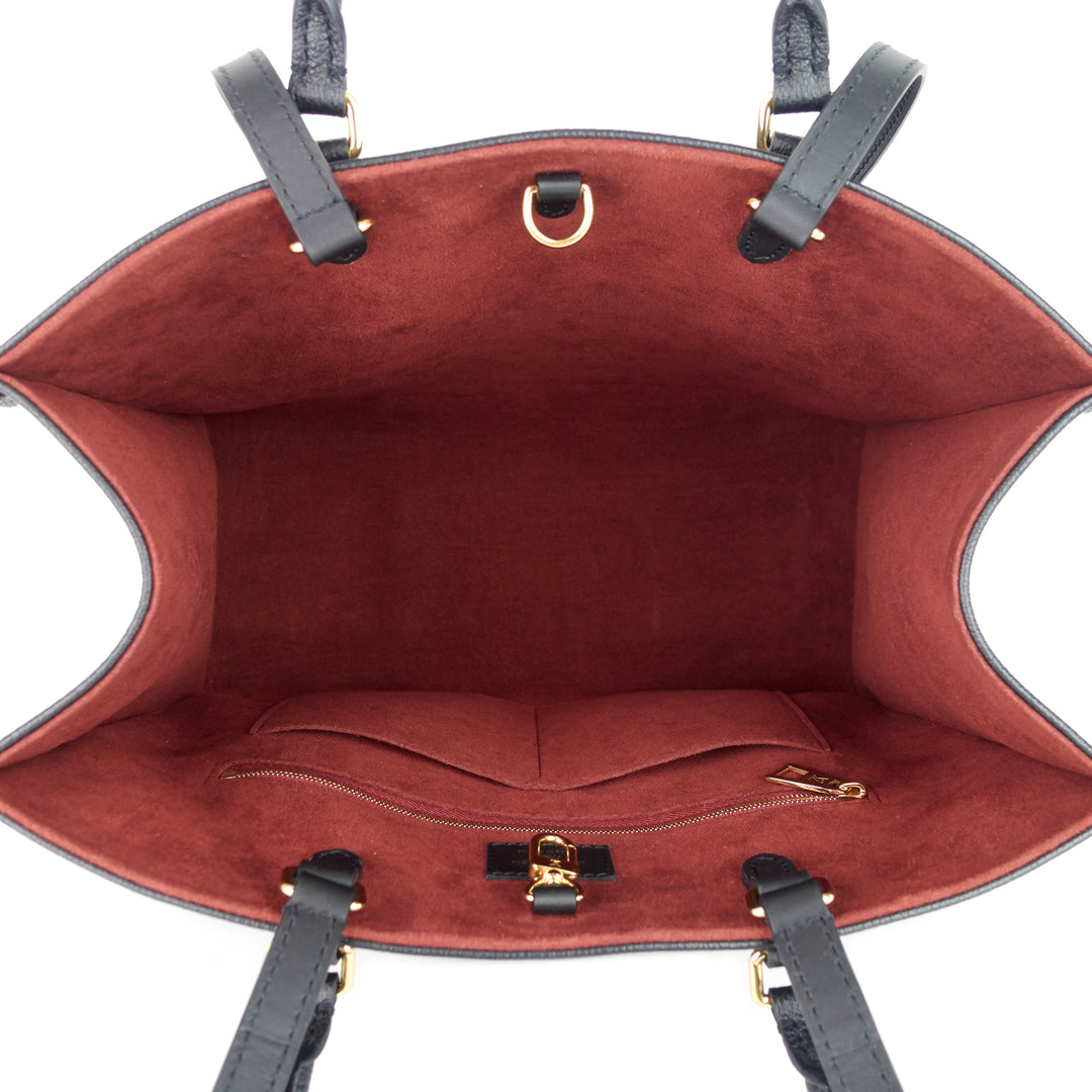 onthego mm bicolour monogram empreinte leather bag